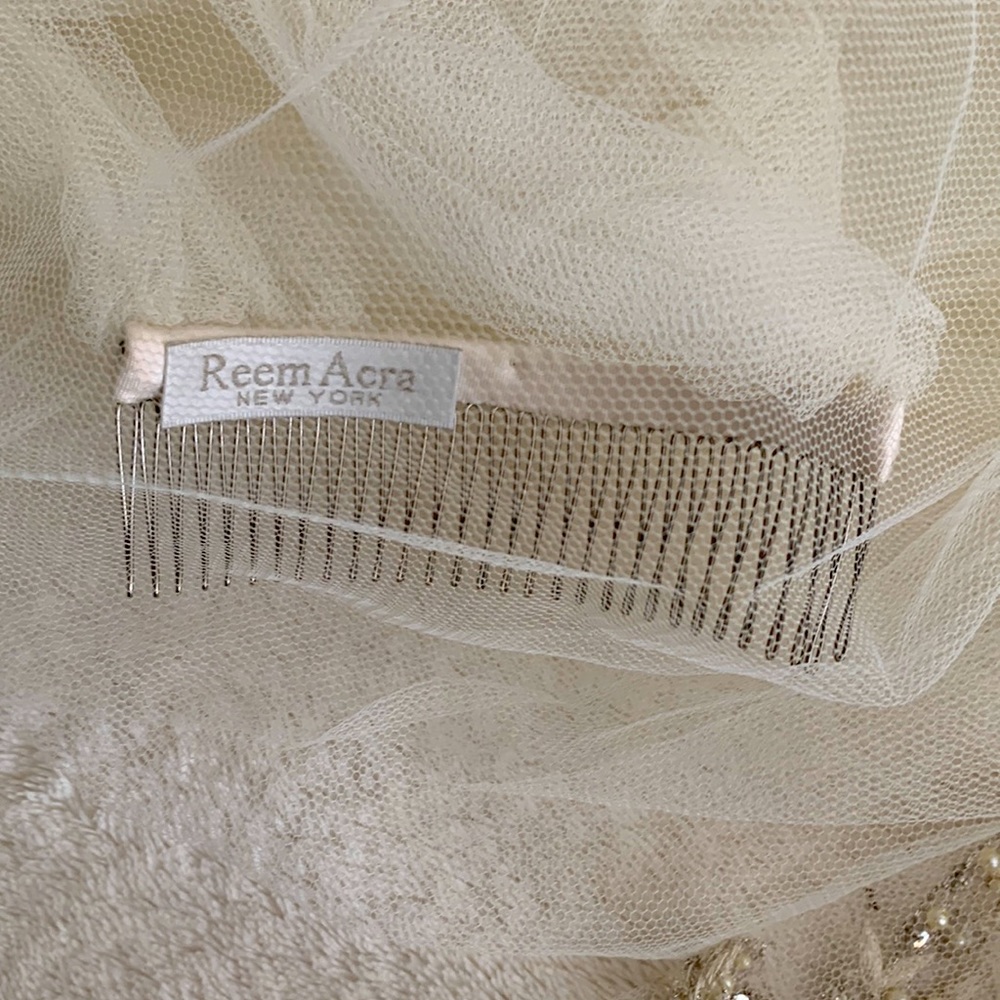 Reem Acra single layer cathedral veil with s floral and crystal detail.